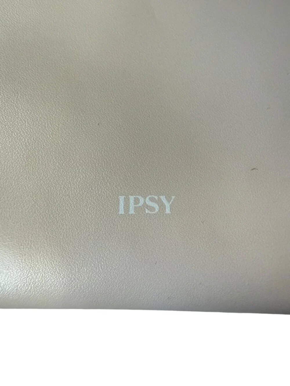 IPSY cream colored zippered cosmetic bag pouch with red interior